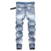 Light-colored stretch ripped jeans